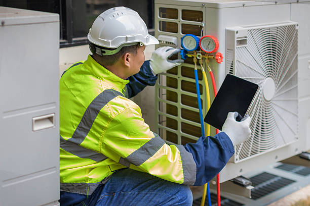 Professional Hvac technician working in Lake Grove, NY